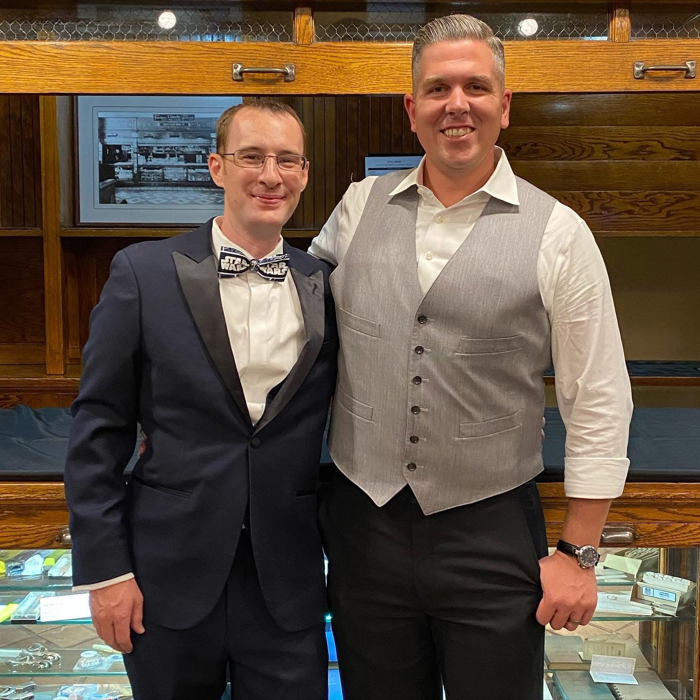 Todd and Jurgy dressed up at a formal event