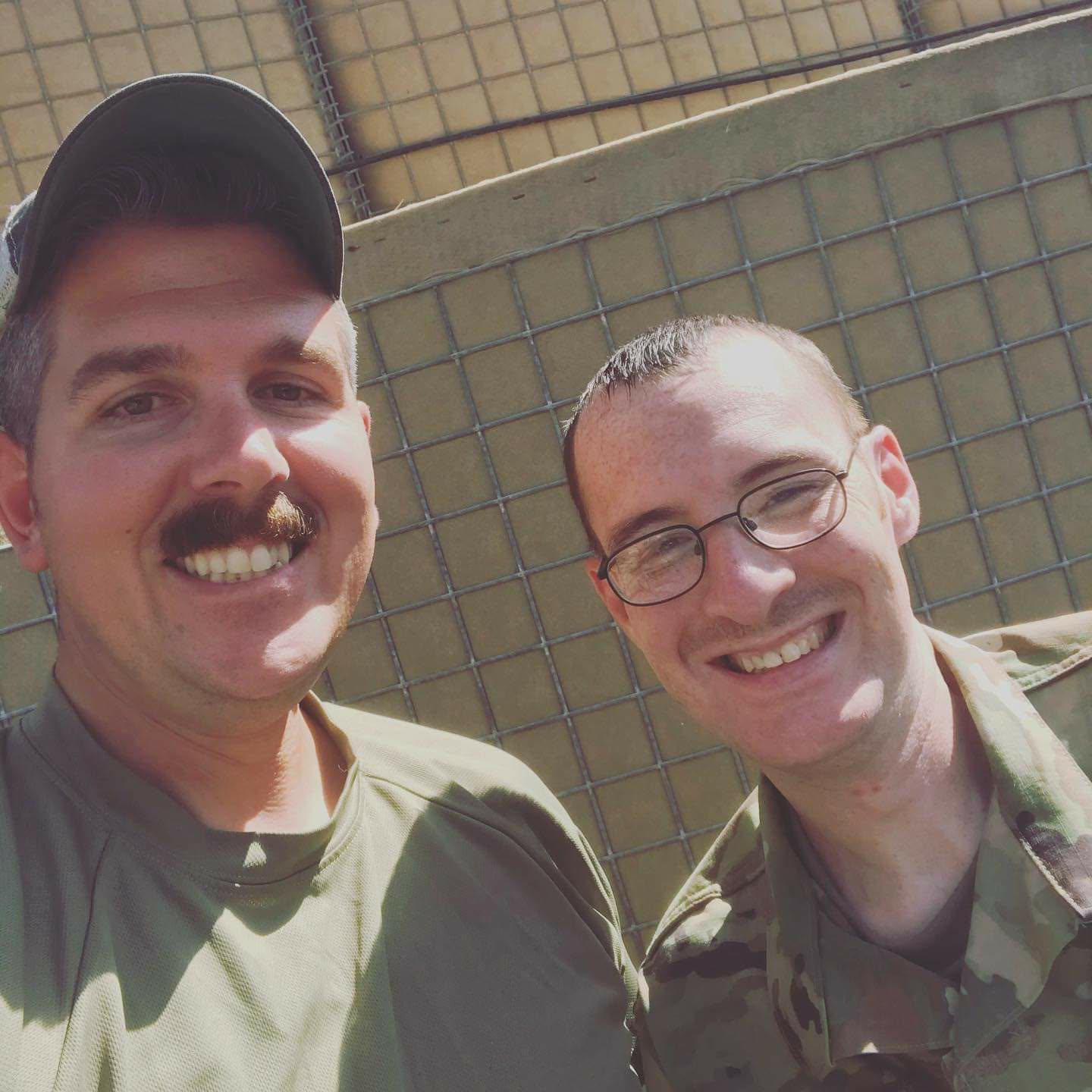 Todd and Jurgy taking a selfie during their military years